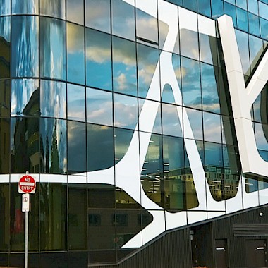 Pleotint: self-tinting window glass