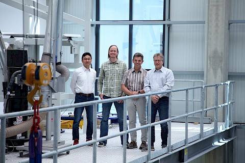 Foto: From left to right: Nobuyuki Ozawa (CDO), Ingo Röpling (Software development), Jürgen Knez (Mechanical development), Jörg Pawlik (Electronic development)